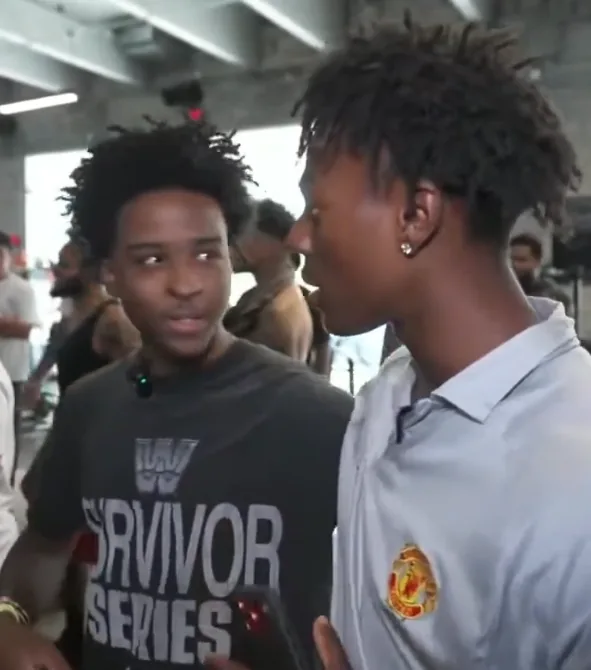 Nitro Camden standing beside IShowSpeed and talking during a livestream.